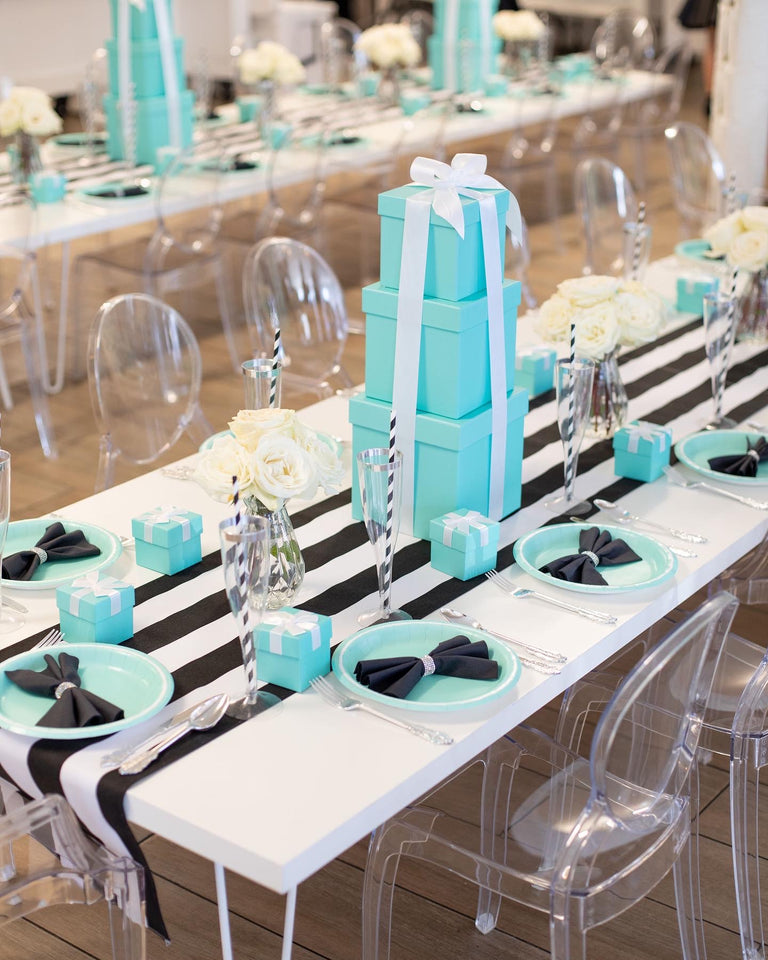 Crystal chairs with custom white tables 